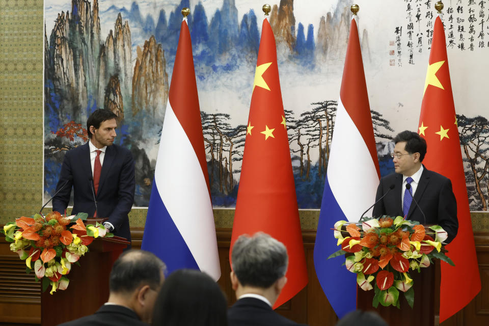 Dutch Deputy Prime Minister and Foreign Minister Wopke Hoekstra, left, and his Chinese counterpart Qin Gang hold a joint news conference following their meeting in Beijing, China, Tuesday May 23, 2023. (Thomas Peter/Pool Photo via AP)