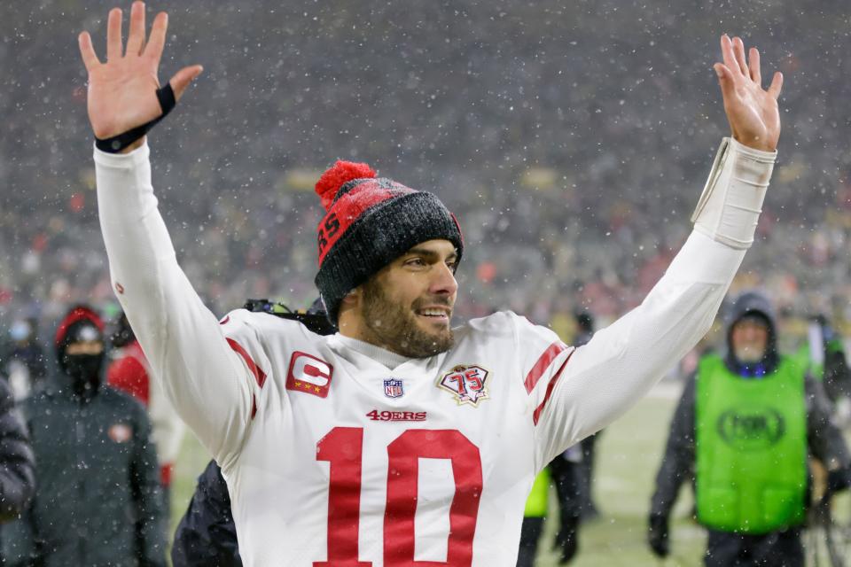 San Francisco 49ers' Jimmy Garoppolo celebrates after an NFC divisional playoff NFL football game Saturday, Jan. 22, 2022, in Green Bay, Wis.