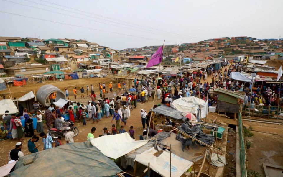 Almost a million Rohingya refugees from Burma are living in camps in Bangladesh  - REUTERS