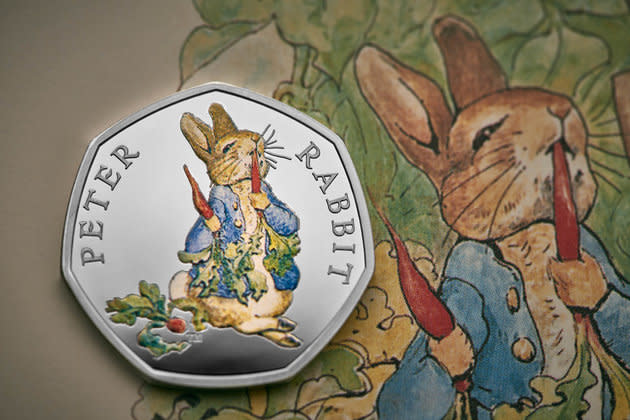 Peter Rabbit eats a carrot on the new 50p design (Royal Mint)