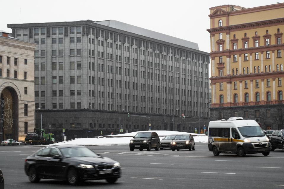 FILE - In this Friday, Dec. 30, 2016 file photo FSB headquarters, grey building at center, in downtown Moscow, Russia. Moscow has been awash with rumours of a hacking-linked espionage plot at the highest level since cyber-security firm Kaspersky said one of its executives with ties to the Russian intelligence services had been arrested on treason charges. (AP Photo/Alexander Zemlianichenko, File)