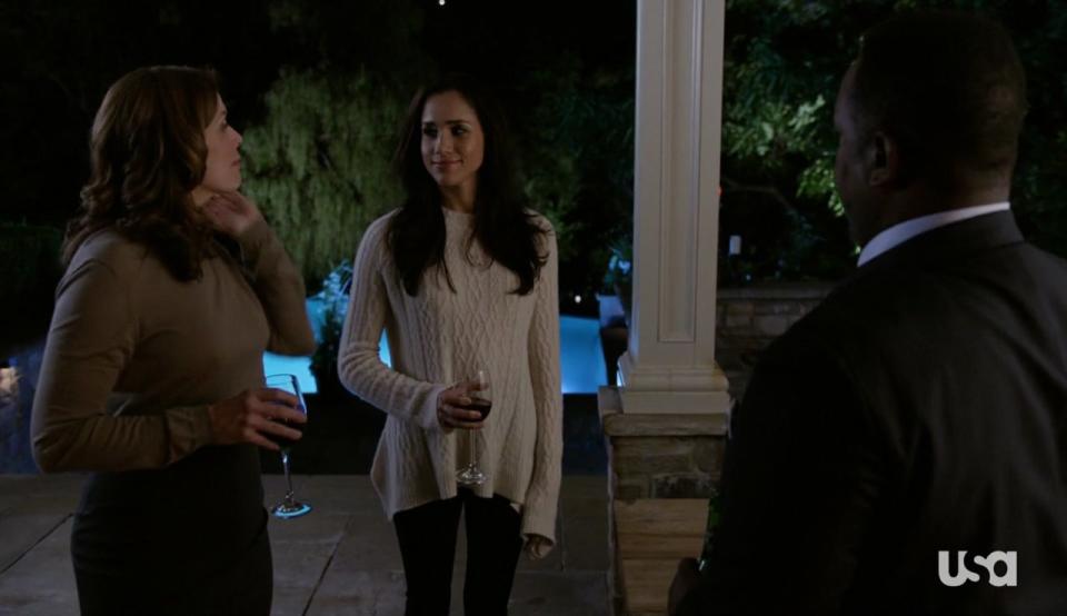 Meghan Markle wears a sweater by The Row on an episode of *Suits*.