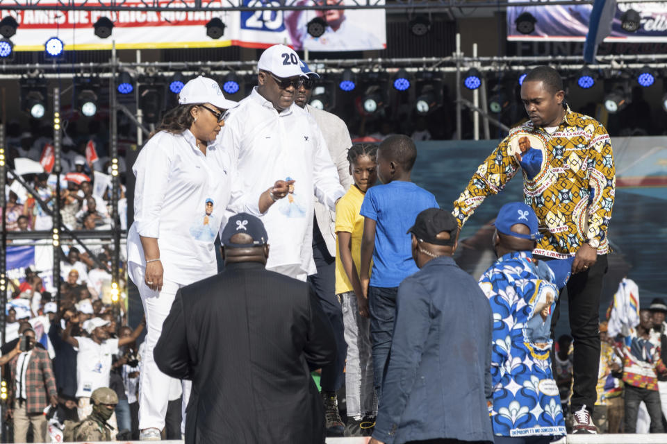 Congo president Félix Tshisekedi attends a campaign rally with his family ahead of the presidential elections, in Kinshasa, Democratic Republic of Congo, Sunday, Nov. 19, 2023. (AP Photo/Samy Ntumba Shambuyi)