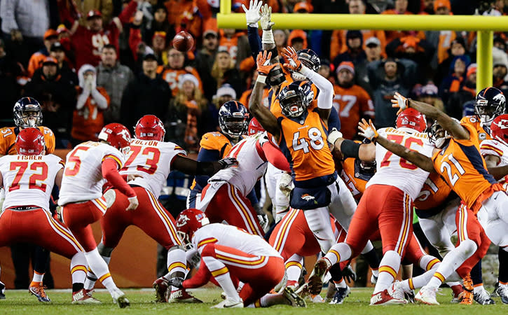 Nov 27, 2016; Denver, CO, USA; Kansas City Chiefs kicker Cairo Santos (5) attempts a field goal against the Denver Broncos in overtime at Sports Authority Field at Mile High. The Chiefs defeated the Broncos 30-27 in overtime.