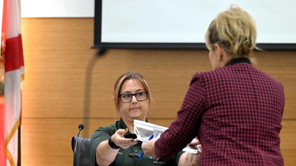 Manatee County Sheriff’s office crime scene tech Meghan Dvorack testifies about latent fingerprints she lifted from a car in the investigation of Troy Davis Sr. on the second day of his trial for second-degree murder in the death of Luis Roblero in 2020 at the Manatee County Judicial Center on Thursday, Oct. 26, 2023.