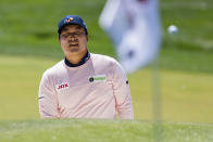 Kyoung-Hoon Lee watches his shot on the 15th hole during the first round of the Wells Fargo Championship golf tournament at Quail Hollow Club on Thursday, May 6, 2021, in Charlotte, N.C. (AP Photo/Jacob Kupferman)