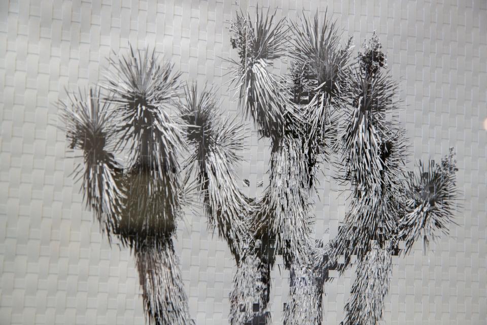 A detail photograph of "Karma Tree #6" shows the weaves of two images by Argentine artist Marcelo Bengoechea inside Super Simple in Palm Springs, Calif., on Wednesday, Feb. 15, 2023.