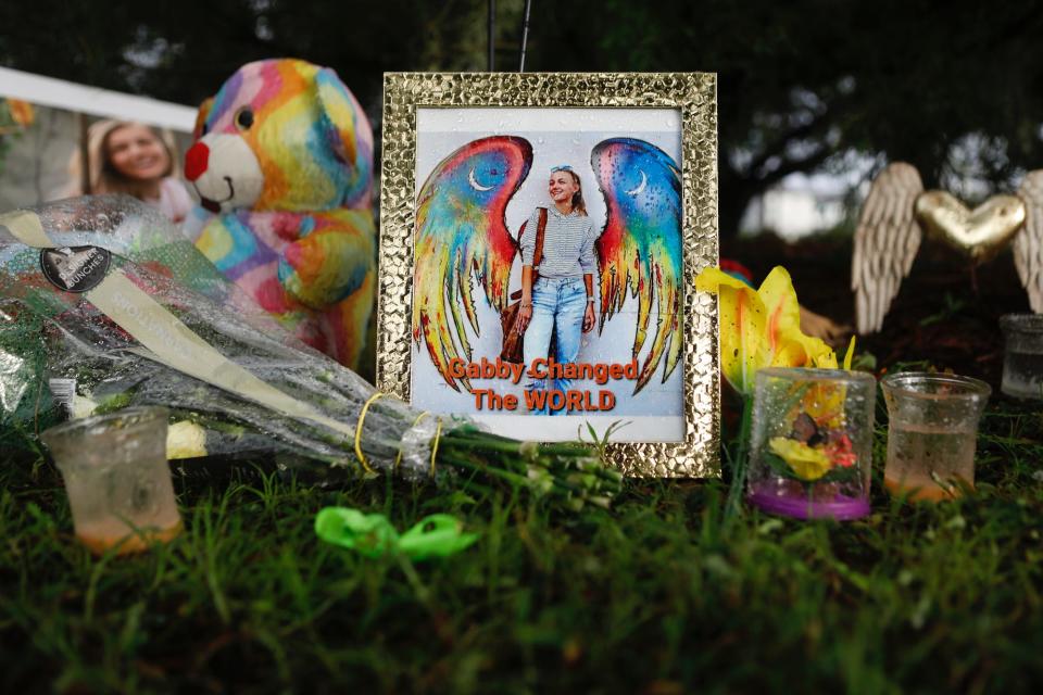 Photos, candles, flowers and teddy bears left for Gabby Petito