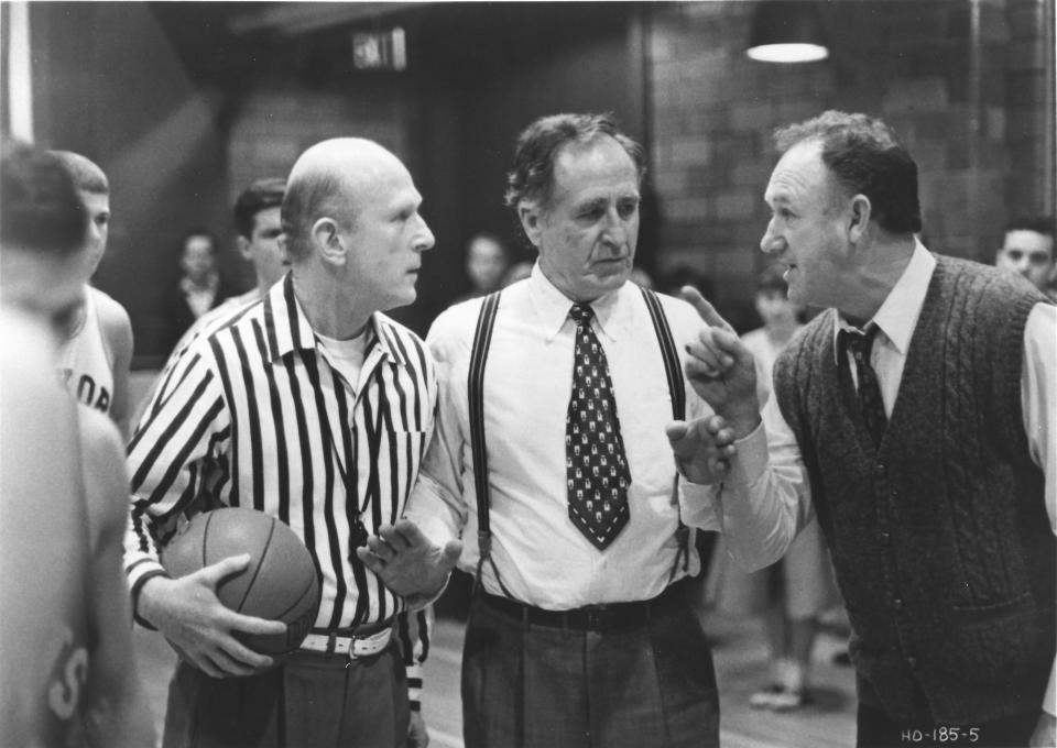 Sheb Wooley, center, and Gene Hackman argue with the referee in this scene from the 1986 film "Hoosiers."