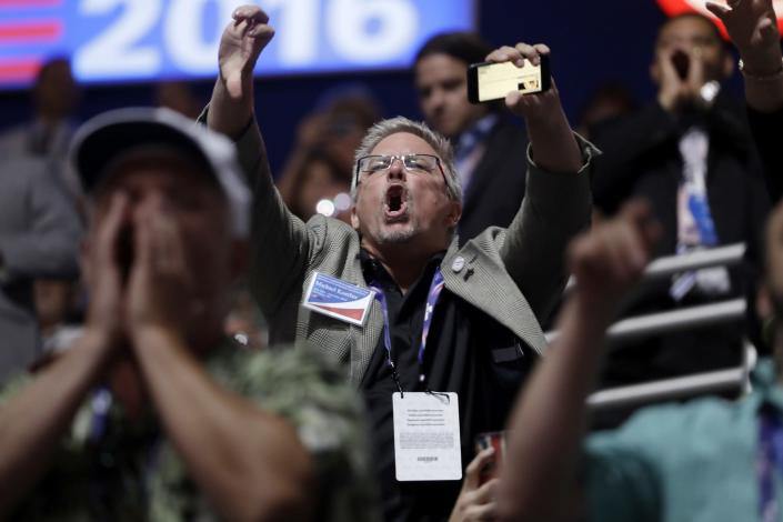 People react to Sen. Ted Cruz, R-Texas, as he addresses delegates during the third day session of the RNC in Cleveland, Ohio, on July 20, 2016. (Photo: Matt Rourke/AP Photo)