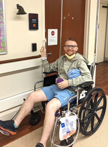 <p>Northwestern Medicine</p> John Nicholas rings the bell at Northwestern Medicine after undergoing a kidney transplant while awake.