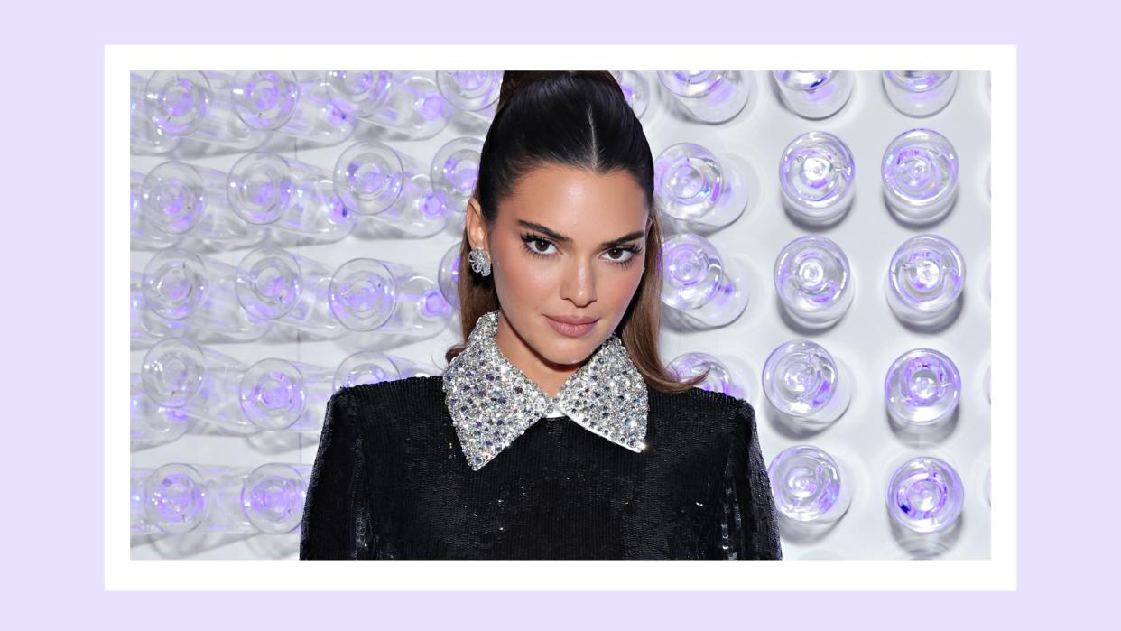  Kendall Jenner pictured wearing a black sequin bodysuit at The 2023 Met Gala Celebrating "Karl Lagerfeld: A Line Of Beauty" at The Metropolitan Museum of Art on May 01, 2023 in New York City/ in a purple template 