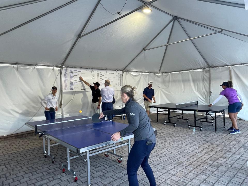 Players and caddies play in the Drive On Ping-Pong Tournament during the LPGA Drive On Championship at Crown Colony Golf & Country Club in Fort Myers on Wednesday.