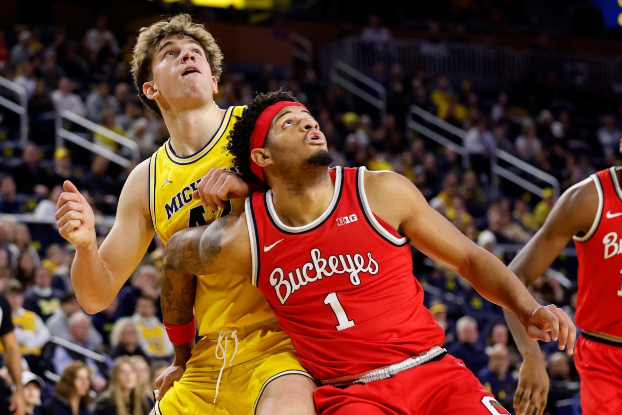 Michigan forward Will Tschetter and Ohio State guard Roddy Gayle Jr. look for the rebound in the first half of U-M's 73-65 win on Monday, Jan. 15, 2024, at Crisler Center.