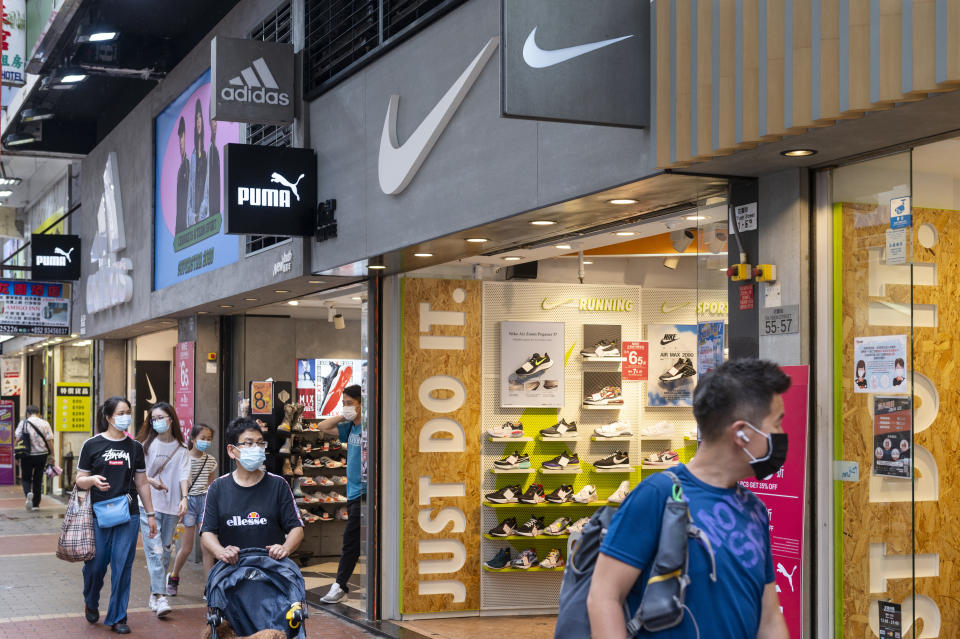 HONG KONG, CHINA - 2020/05/11: Multinational sport clothing brands Adidas and Nike logos seen at a store in Hong Kong. (Photo by Budrul Chukrut/SOPA Images/LightRocket via Getty Images)