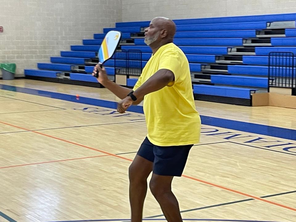 FILE - Glenn Hazelwood goes in for a lob during a pickleball match in the Robert Howard Community Center at Diamond Lakes Regional Park in Augusta. Diamond Lakes has had a fair amount of work done this year.