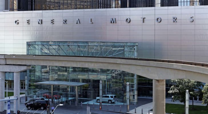 General Motors (GM) spelled out on front of silver-colored building