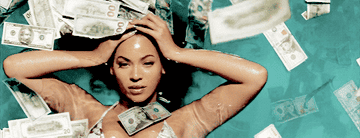 Beyoncé rolling in a pool money