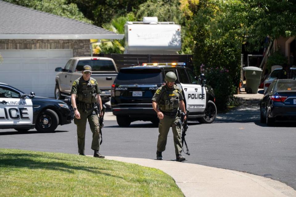 Police officers leave Zion Court in Rocklin after murder suspect Eric James Abril was captured behind the property on Monday, July 10, 2023, a day after he escaped custody from a Roseville hospital.