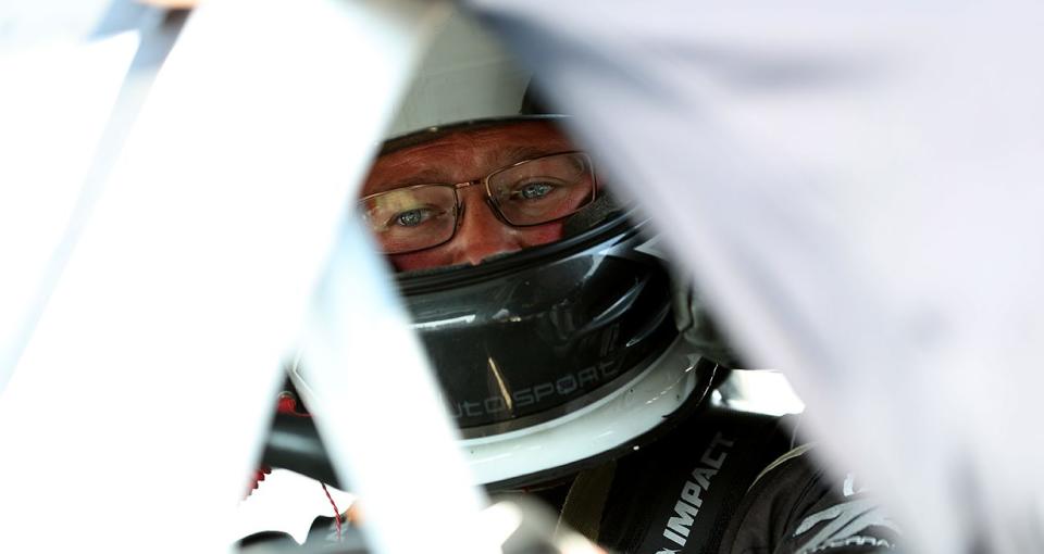 Mike Leaty, driver of the #25 Northeast Industrials Technology, sits in his car prior to the Nu Way Auto Parts 150 for the NASCAR Whelen Modified Tour at New York International Raceway Park in Lancaster, New York on July 31, 2021. (Bryan Bennett/NASCAR)