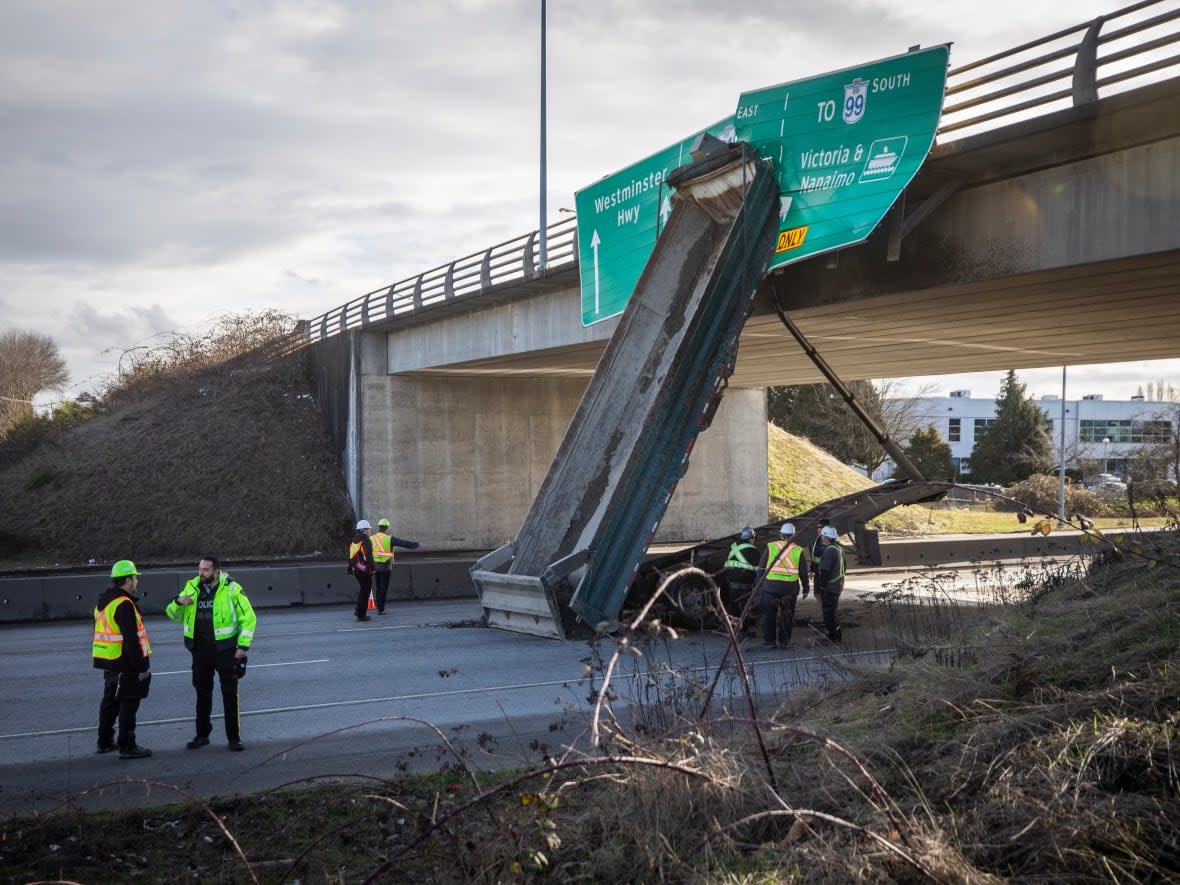 A commercial truck’s trailer is pictured after crashing into the Cambie Road overpass on Knight Street in Richmond, B.C., on Friday. (Ben Nelms/CBC - image credit)