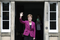 Scotland's First Minister and Scottish National Party leader Nicola Sturgeon poses for photographers, at Bute House in Edinburgh, Scotland. Sunday, May 9, 2021. British Prime Minister Boris Johnson has invited the leaders of the U.K.’s devolved nations for crisis talks on the union after Scotland’s pro-independence party won its fourth straight parliamentary election. Sturgeon said the election results proved a second independence vote for Scotland was “the will of the country." She said any London politician who stood in the way would be “picking a fight with the democratic wishes of the Scottish people.” (AP Photo/Scott Heppell)