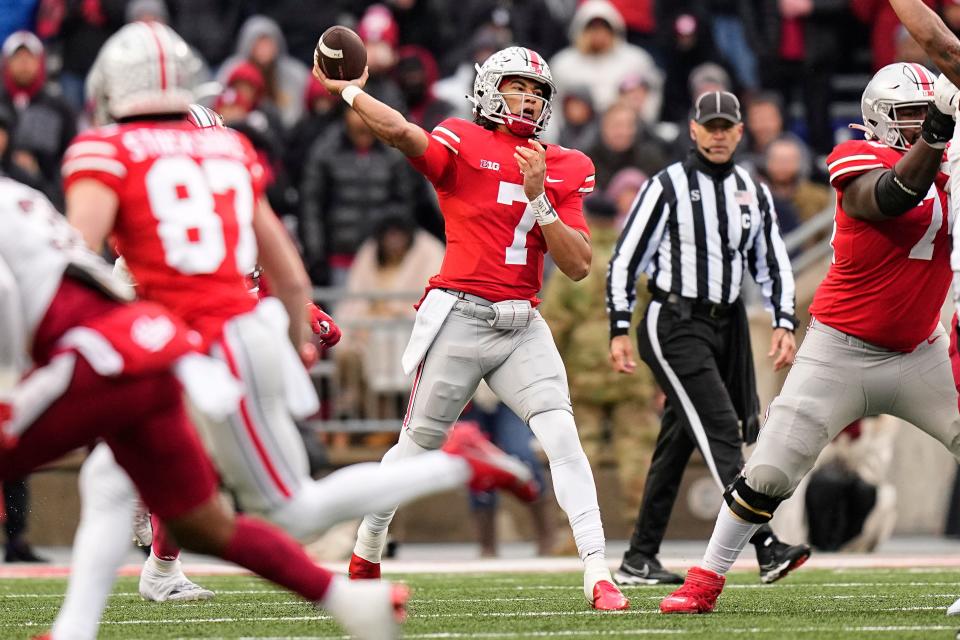 Nov 12, 2022; Columbus, Ohio, USA;  Ohio State Buckeyes quarterback C.J. Stroud (7) throws during the second half of the NCAA football game against the Indiana Hoosiers at Ohio Stadium. Ohio State won 56-14. Mandatory Credit: Adam Cairns-The Columbus Dispatch