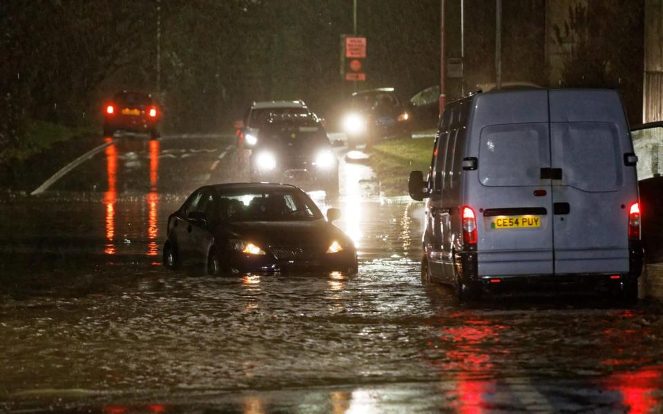 Cars stuck in floodwater - Athena Pictures 