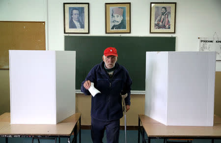 A man votes during a referendum on "Statehood Day" in Laktasi near Banja Luka, Bosnia and Herzegovina, September 25, 2016. REUTERS/Dado Ruvic