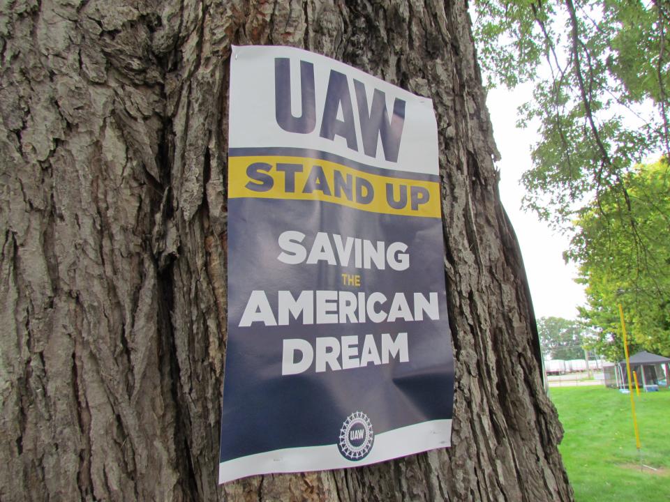 A United Auto Workers strike sign stapled to a tree at the Marysville National Parts Distribution Center on Sept. 27, 2023.