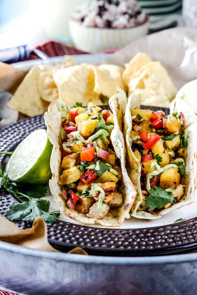 <p>Pineapple is about to replace guac as your fave taco topping.</p><p>Get the recipe from <a href="http://carlsbadcravings.com/chili-lime-chicken-tacos-with-grilled-pineapple-salsa/" rel="nofollow noopener" target="_blank" data-ylk="slk:Carlsbad Cravings;elm:context_link;itc:0;sec:content-canvas" class="link ">Carlsbad Cravings</a>.</p>