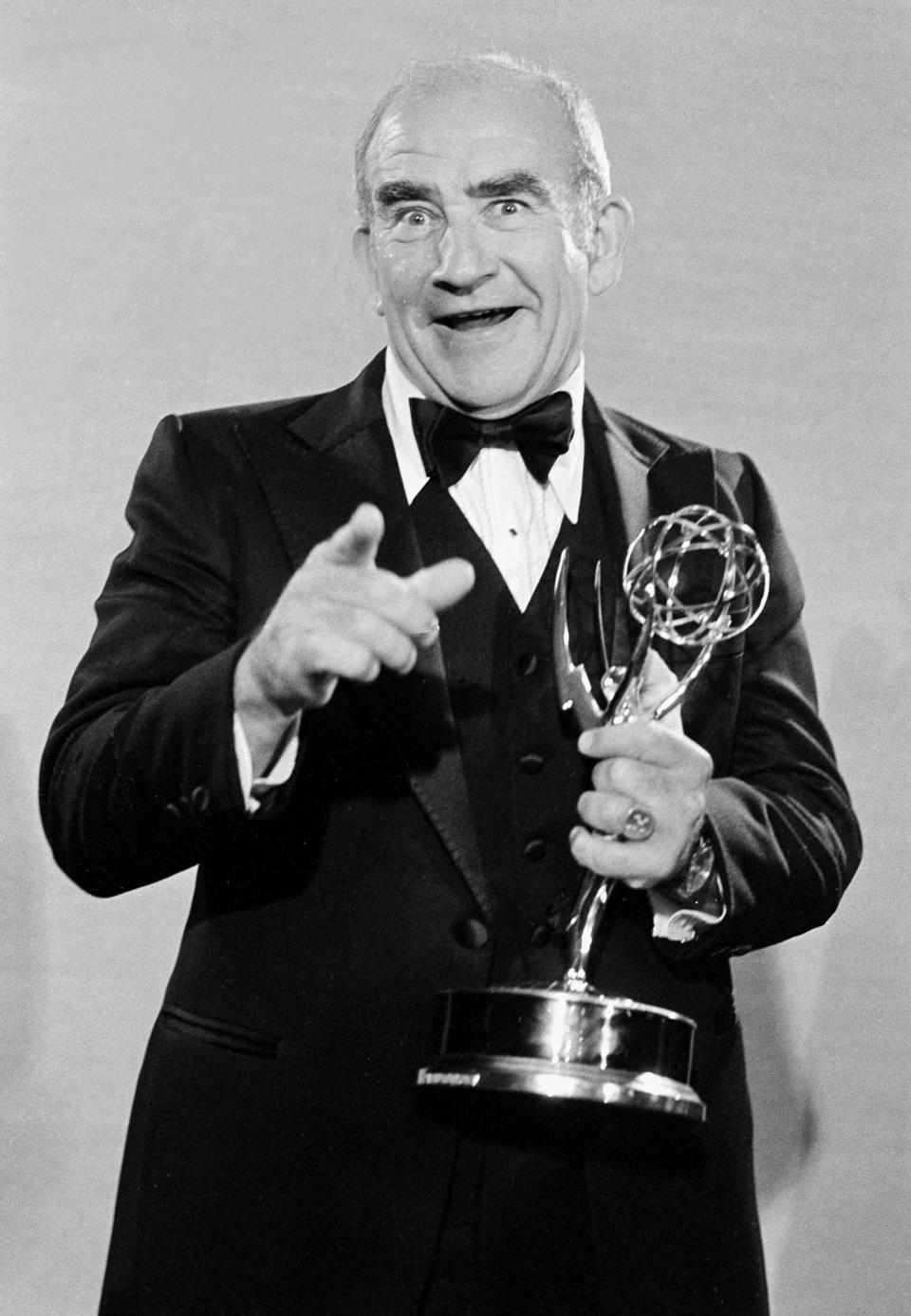 FILE - In this Sept.17, 1978., file photo, actor Ed Asner poses backstage with his Emmy statuette at the 30th annual Primetime Emmy Awards at the Pasadena Civic Auditorium, in Pasadena, Calif. Asner won his sixth Emmy for Outstanding Lead Actor in a Drama Series for "Lou Grant." Asner, the blustery but lovable Lou Grant in two successful television series, has died. He was 91. Asner's representative confirmed the death in an email Sunday, Aug. 29, 2021, to The Associated Press. (AP Photo, File)