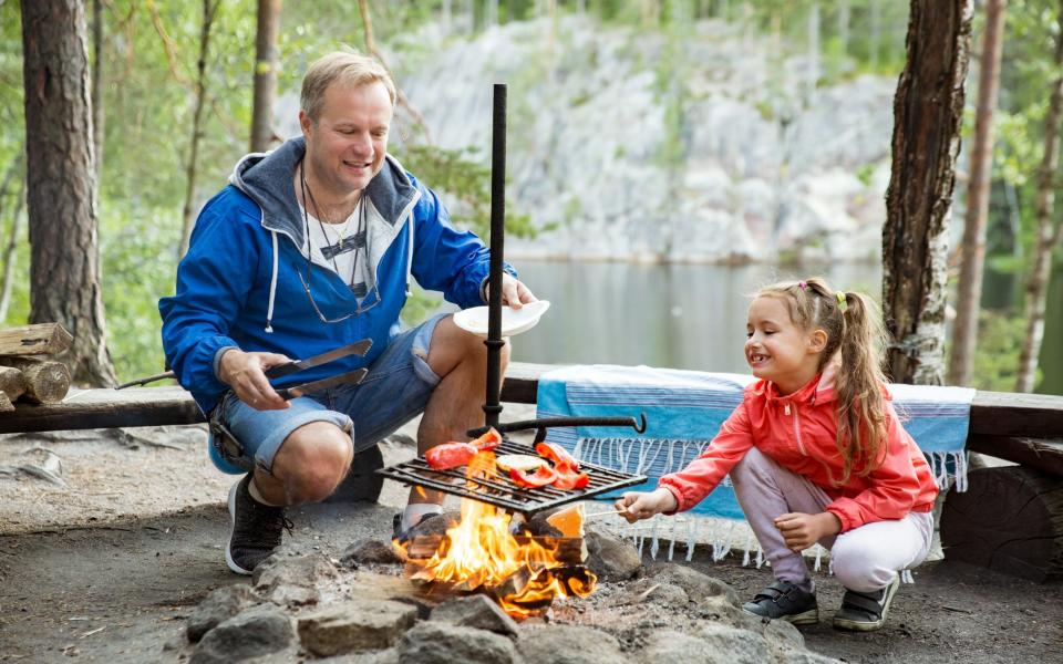 Family forest cooking in Finland - Getty Images/iStockphoto