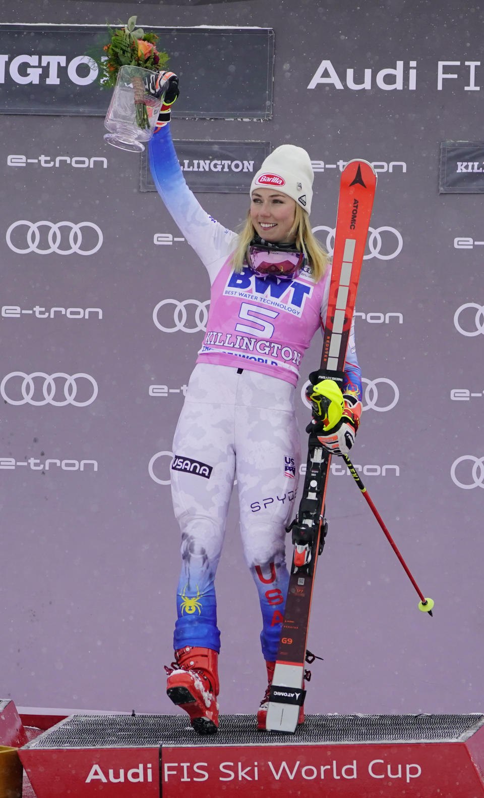 United State's Mikaela Shiffrin celebrates on the podium after finishing first in a women's World Cup slalom ski race Sunday, Nov. 28, 2021, Killington, Vt. (AP Photo/Robert F. Bukaty)