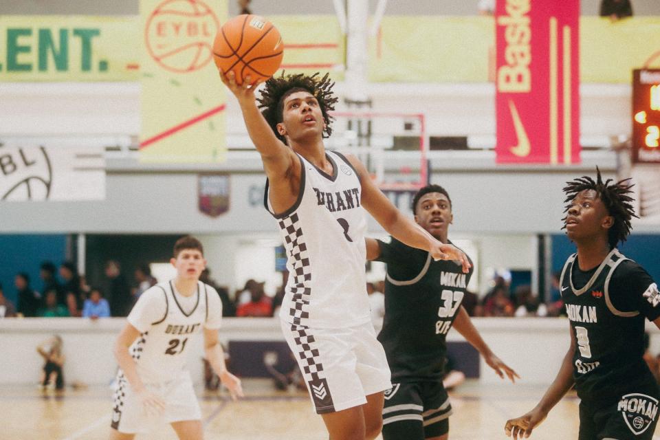 Team Durant’s Acaden Lewis (8) goes for a lay up during a game against Team Mokan Elite during the Nike Elite Youth Basketball League session one on Saturday, April 27, 2024 at the Memphis Sports & Event Center in Memphis, Tenn.