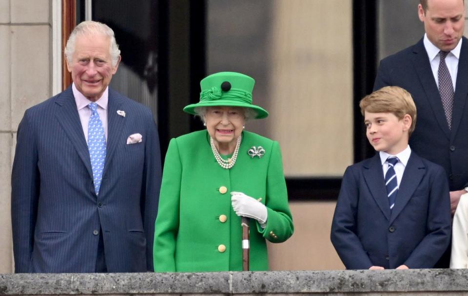 The Prince of Wales, Queen Elizabeth II, Prince George and the Duke of Cambridge, appear on the balcony of Buckingham Palace at the end of the Platinum Jubilee Pageant (PA)