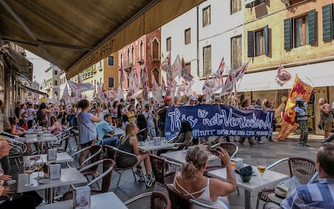 Venetians protest against mass tourism in the summer of 2018 - Credit: Getty