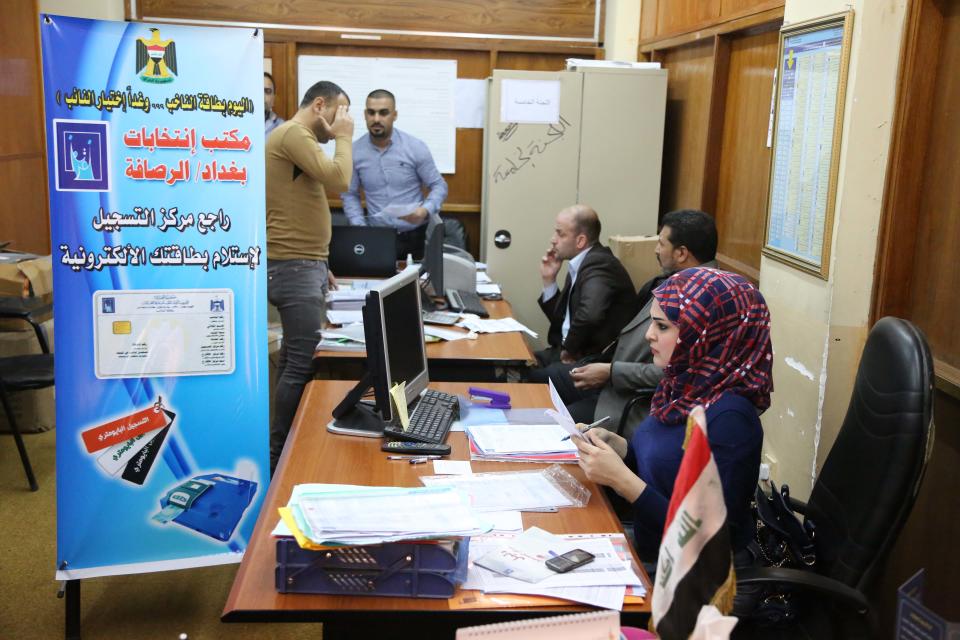 Election officials prepare to distribute voter ID cards to Iraqi citizens in Baghdad, Iraq, Saturday, Feb. 22, 2014. A spokesman for Iraq’s election commission says authorities have begun to distribute voter ID cards in all but one of the country’s 18 provinces, preparing for an April election that will be the first since the 2011 withdrawal of the U.S. forces. (AP Photo/Karim Kadim)