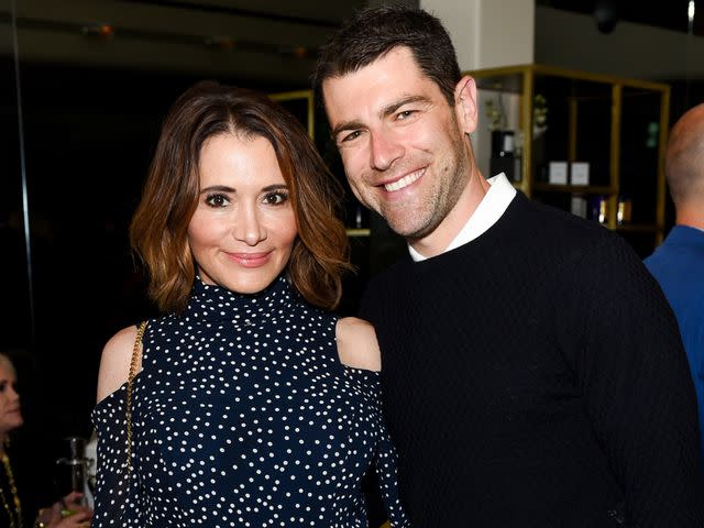 <p>Presley Ann/Getty</p> Tess Sanchez and Max Greenfield at Ira and Bill DeWitt's Saint candle launch in 2019.