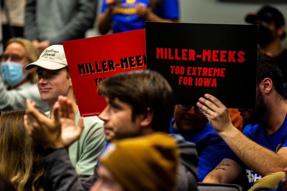 Signs at a campaign event for 1st Congressional District candidate state Rep. Christina Bohannan, D-Iowa City, read "Miller-Meeks too extreme for Iowa" and "Miller-Meeks too extreme on abortion," Wednesday, Oct. 19, 2022, at the Iowa Memorial Union in Iowa City, Iowa.