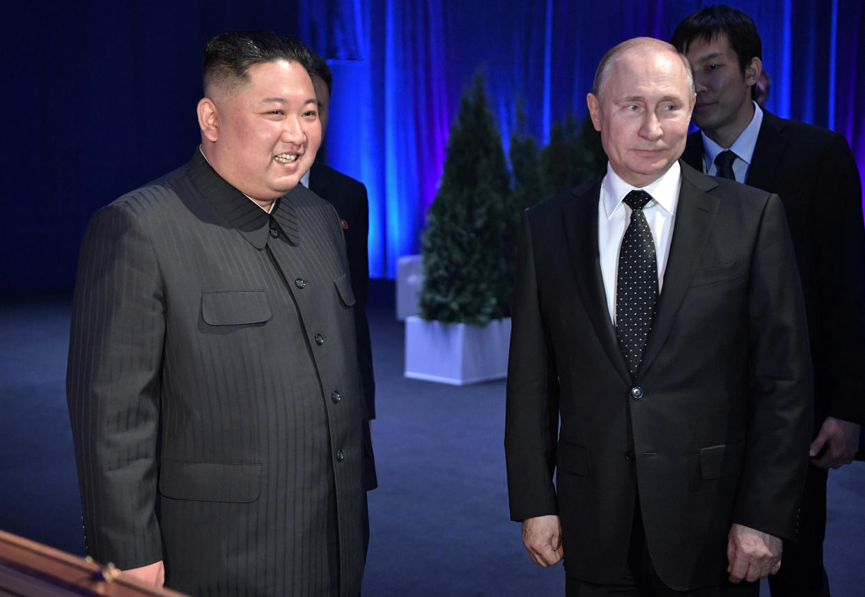 Russia's President Vladimir Putin (R) and North Korea's leader Kim Jong Un attend a present-exchanging ceremony following their talks in Vladivostok, Russia April 25, 2019. Sputnik/Alexei Nikolsky/Kremlin via REUTERS ATTENTION EDITORS - THIS IMAGE WAS PROVIDED BY A THIRD PARTY.