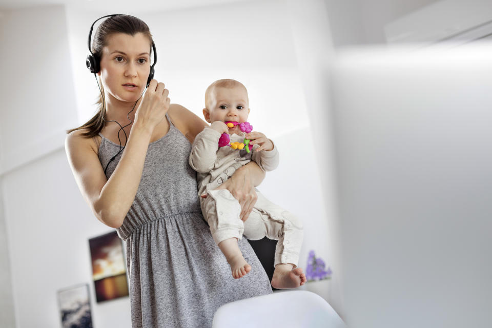 A mom working from home. (Getty Images)