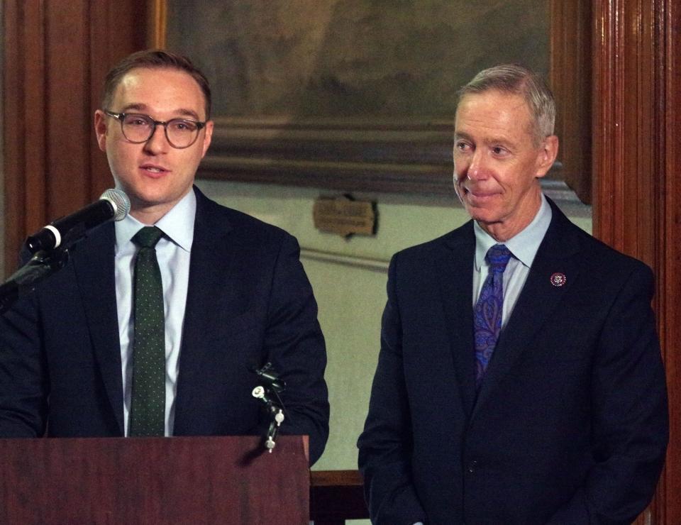 Eric Shupin, director of public policy for Citizens Housing and Planning Solutions, speaks to the audience at Brockton City Hall on Thursday, May 4, 2023, concerning affordable housing in the wake of the Silicon Valley Bank collapse. To the right is U.S. Rep. Stephen F. Lynch.