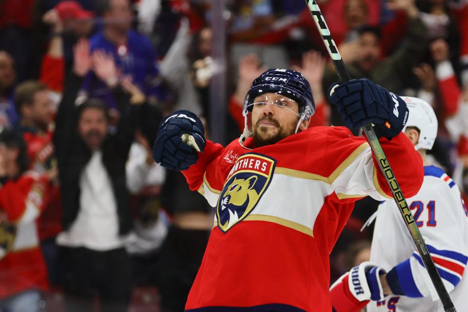 May 28, 2024; Sunrise, Florida, USA; Florida Panthers center Sam Reinhart (13) celebrates after scoring the game-winning goal during overtime against the New York Rangers in game four of the Eastern Conference Final of the 2024 Stanley Cup Playoffs at Amerant Bank Arena. Mandatory Credit: Sam Navarro-USA TODAY Sports