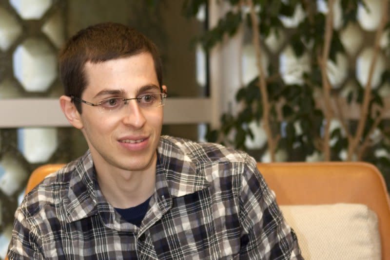 Israeli soldier Gilad Shalit speaks with France's ambassador to Israel Christophe Bigot (unseen) at the French Embassy in the Mediterranean city of Tel Aviv on January 11, 2012. On June 25, 2006, Shalit was kidnapped by militants from the Gaza Strip. He was released Oct. 18, 2011. File Photo by Jack Guez/UPI