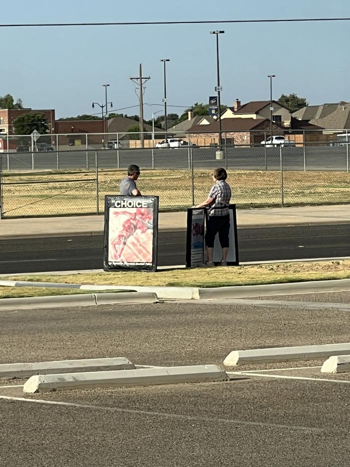 Protesters outside of Tumbleweed and Sage. (Photo: Destiny Adams)