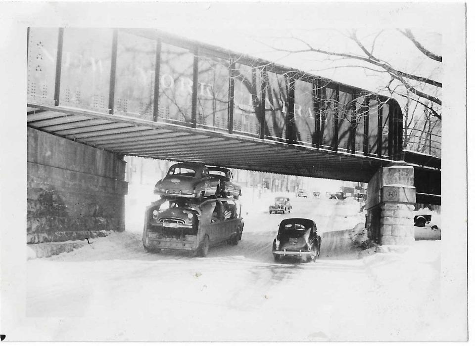 This undated photo of the West Ave. bridge in Canandaigua shows a westbound truck using the left lane to avoid contact with the bridge as it approaches Main Street.