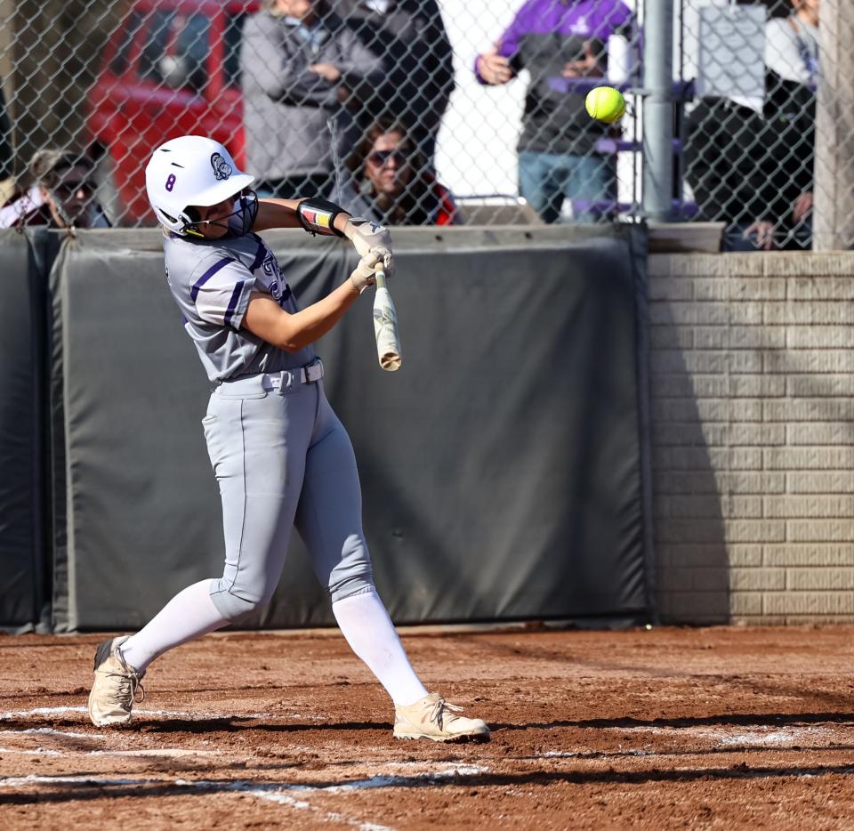 Triway's Emma Flinner smashes a home run earlier in the season.