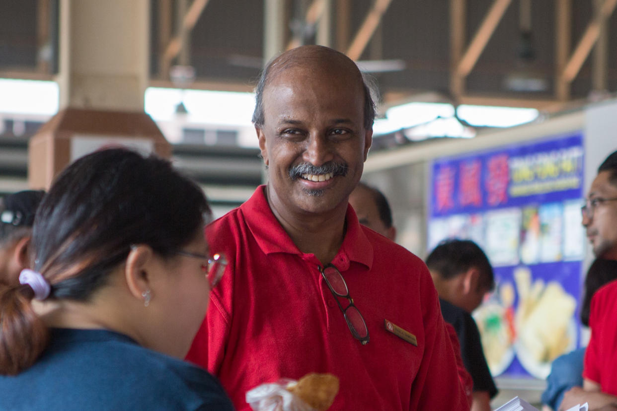 SDP chairman Paul Tambyah smiles during a party walkabout at the Ghim Moh Market and Food Centre on 3 November 2019. (PHOTO: Dhany Osman / Yahoo News Singapore)