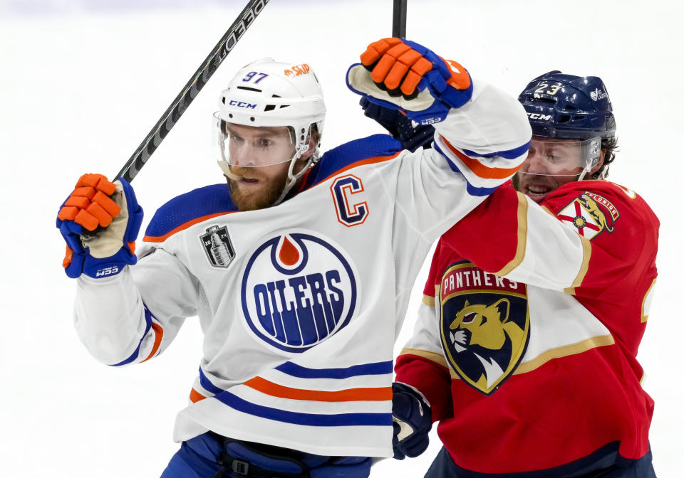 SUNRISE, FL - JUNE 24:  Edmonton Oilers center Connor McDavid (97) and Florida Panthers center Carter Verhaeghe (23) during the NHL Stanley Cup Finals, Game 7 between the Florida Panthers and Edmonton Oilers on June 24th, 2024 at Amerant Bank Arena in Sunrise, FL. (Photo by Andrew Bershaw/Icon Sportswire via Getty Images)